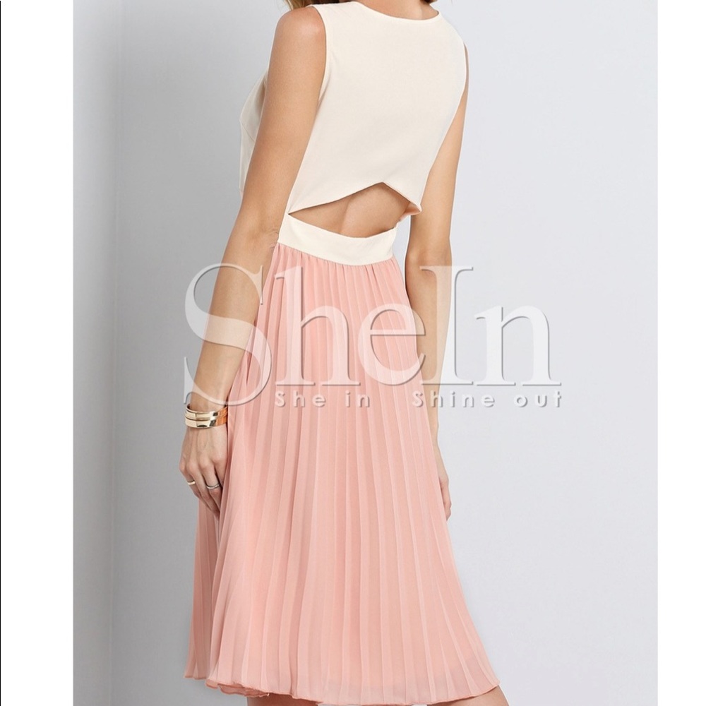 Nude sleeveless poplin cut out pleated dress